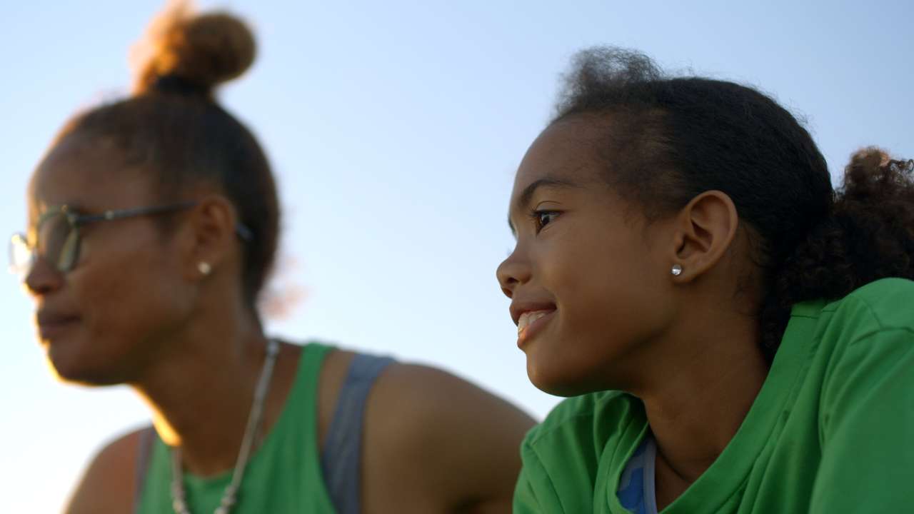 a mother and daughter next to each other