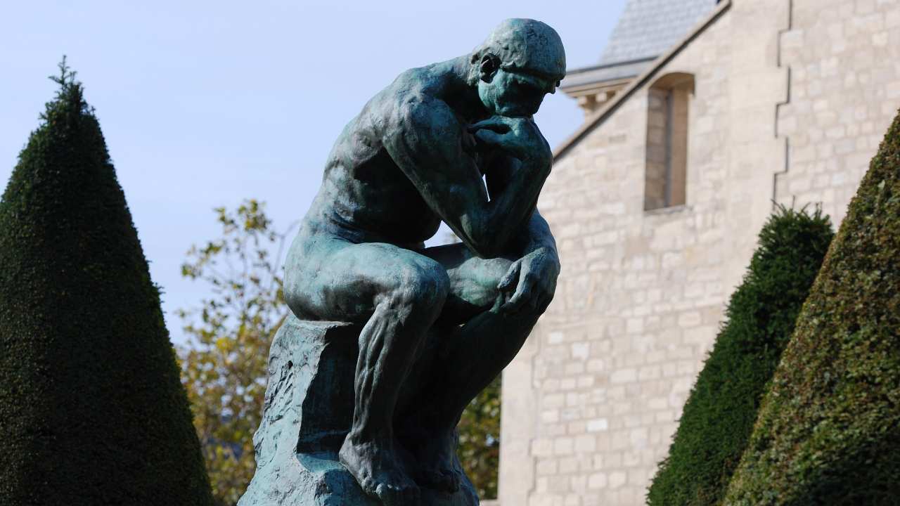 a statue of a thinking man