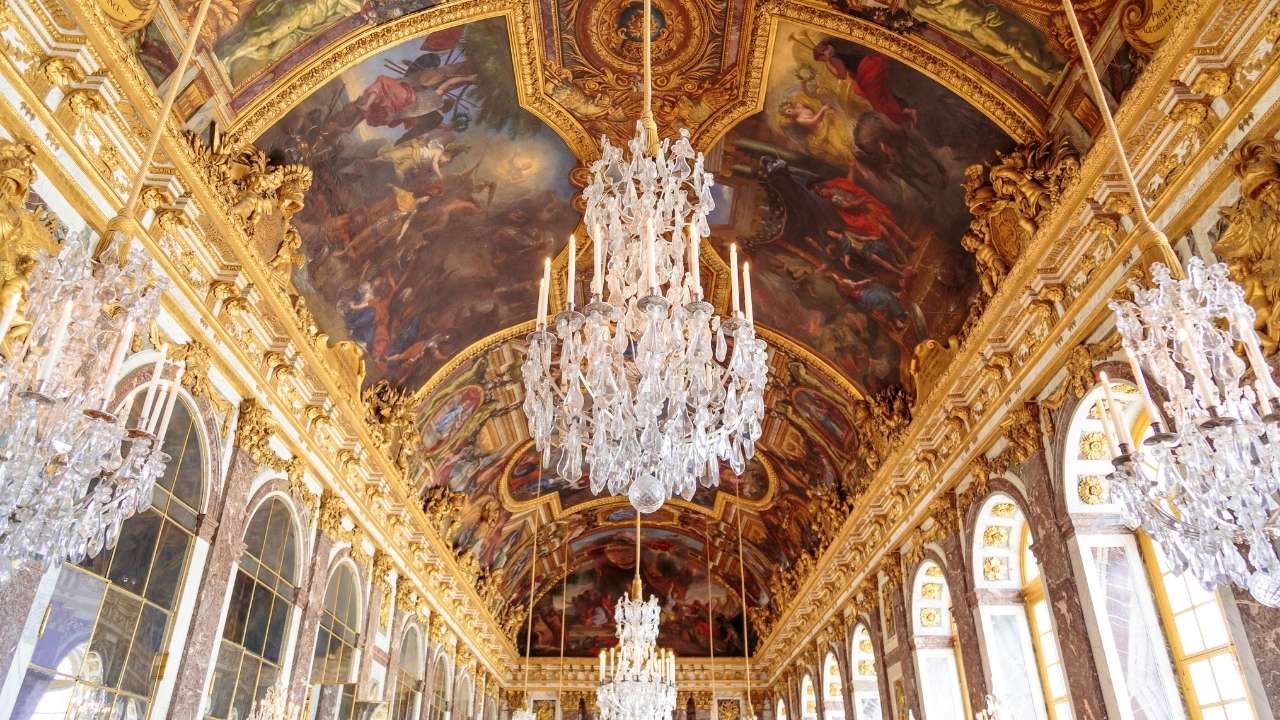 an ornate ceiling with chandeliers
