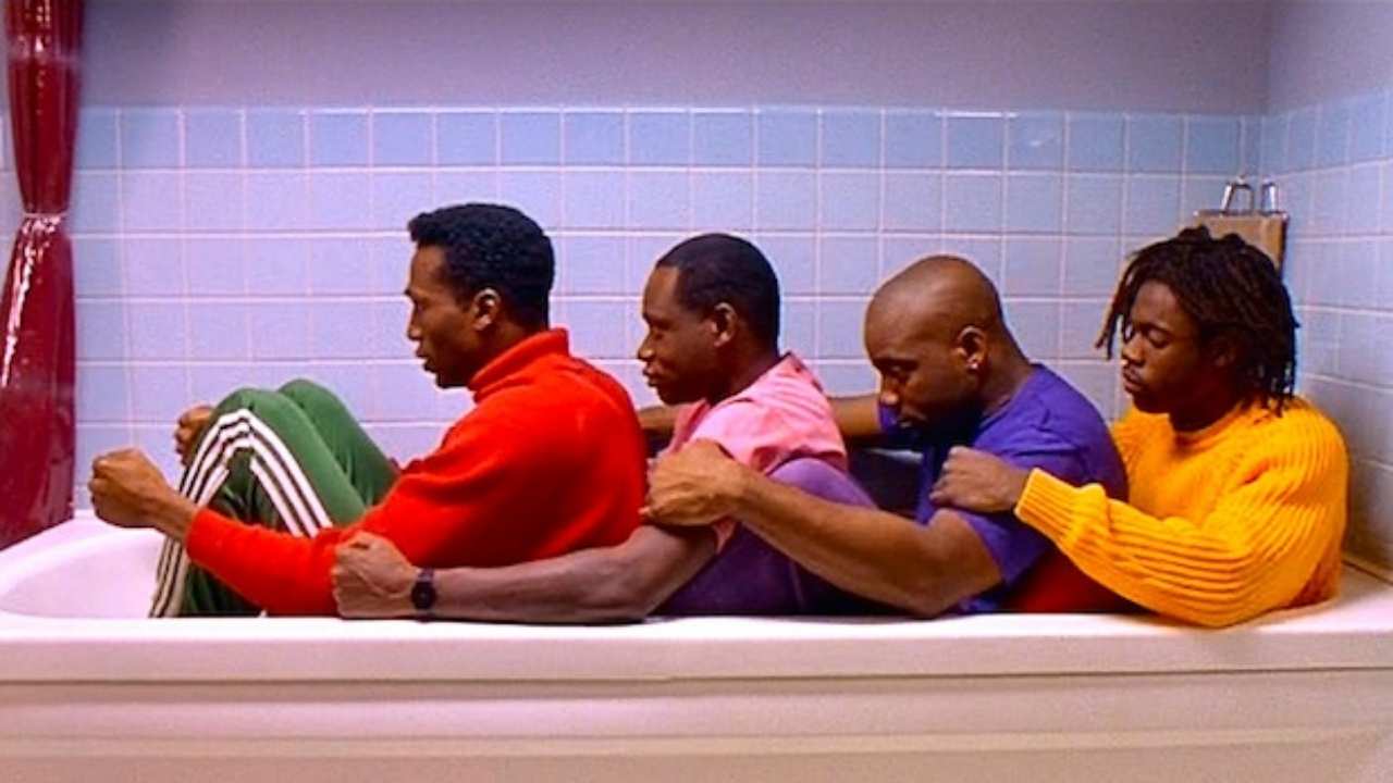 four men in a bathtub
