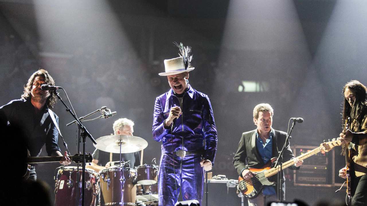 The Tragically Hip performing on stage