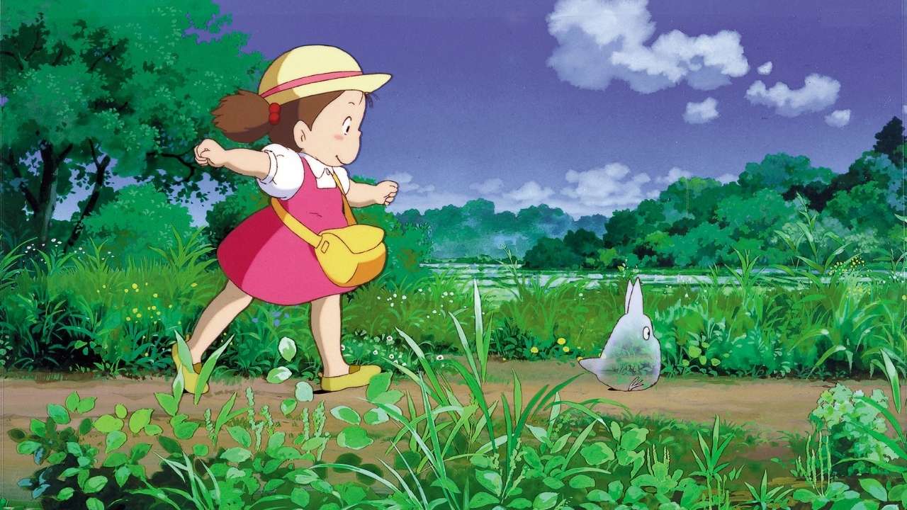 girl running through the grass