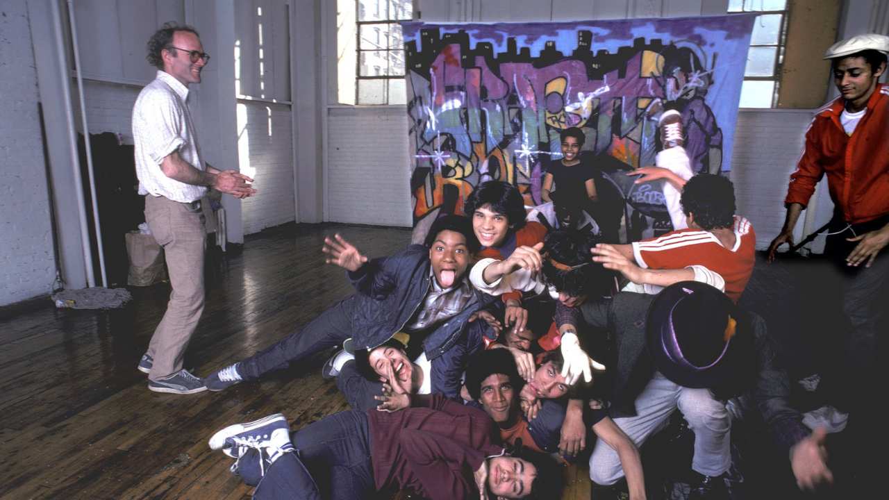 a group of teenagers posing for a photo