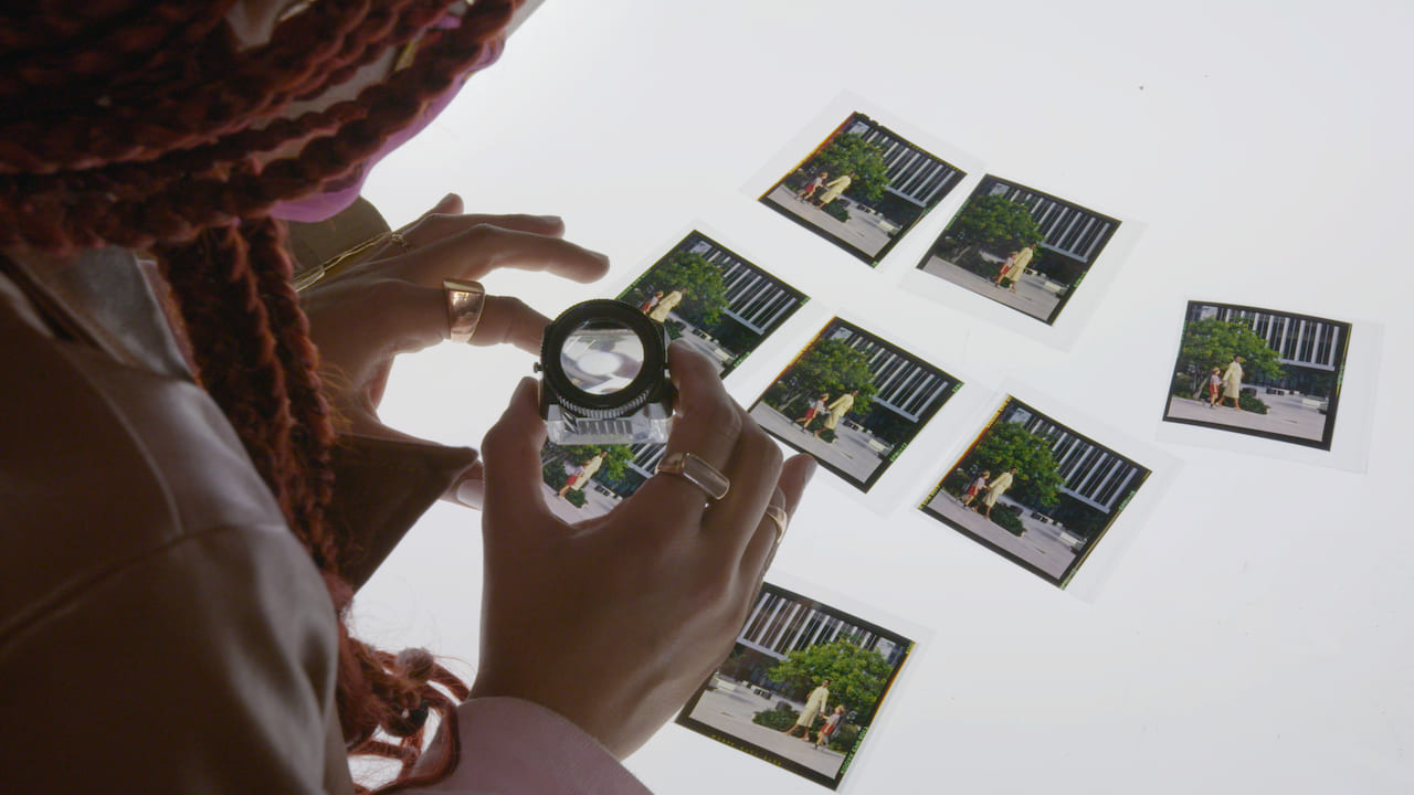 Person looking at images on a light table