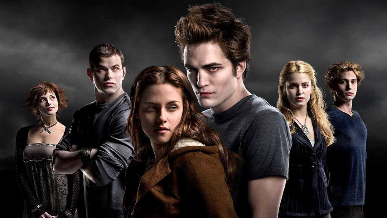 five vampires and a young woman standing together