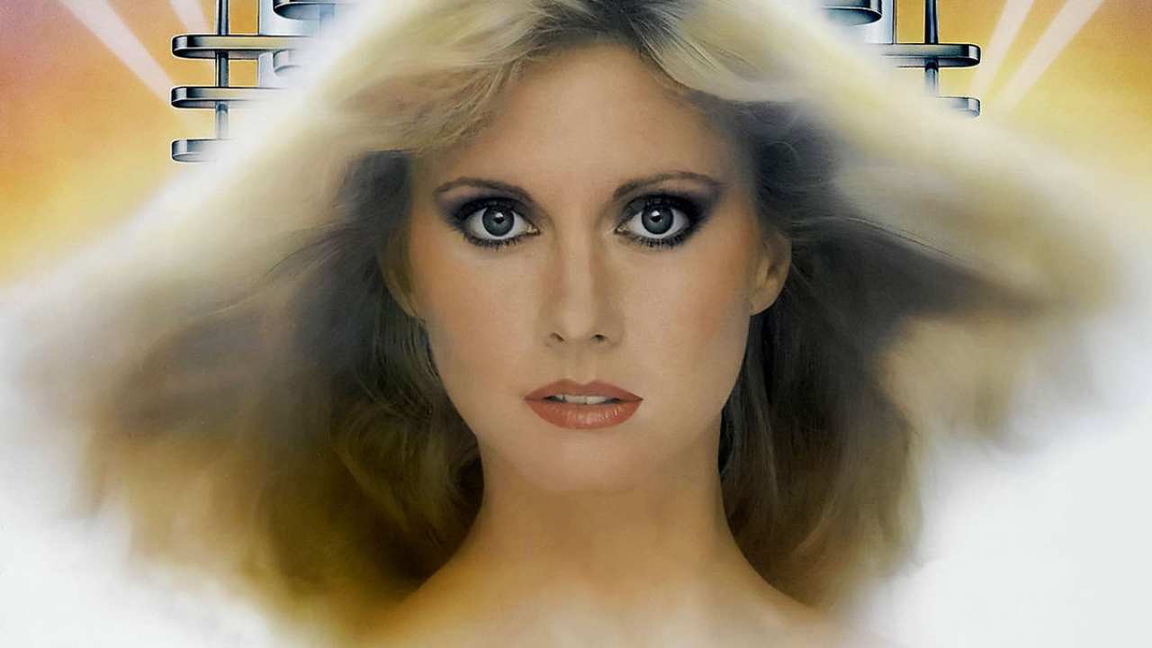 Olivia Newton-John looking directly at the camera